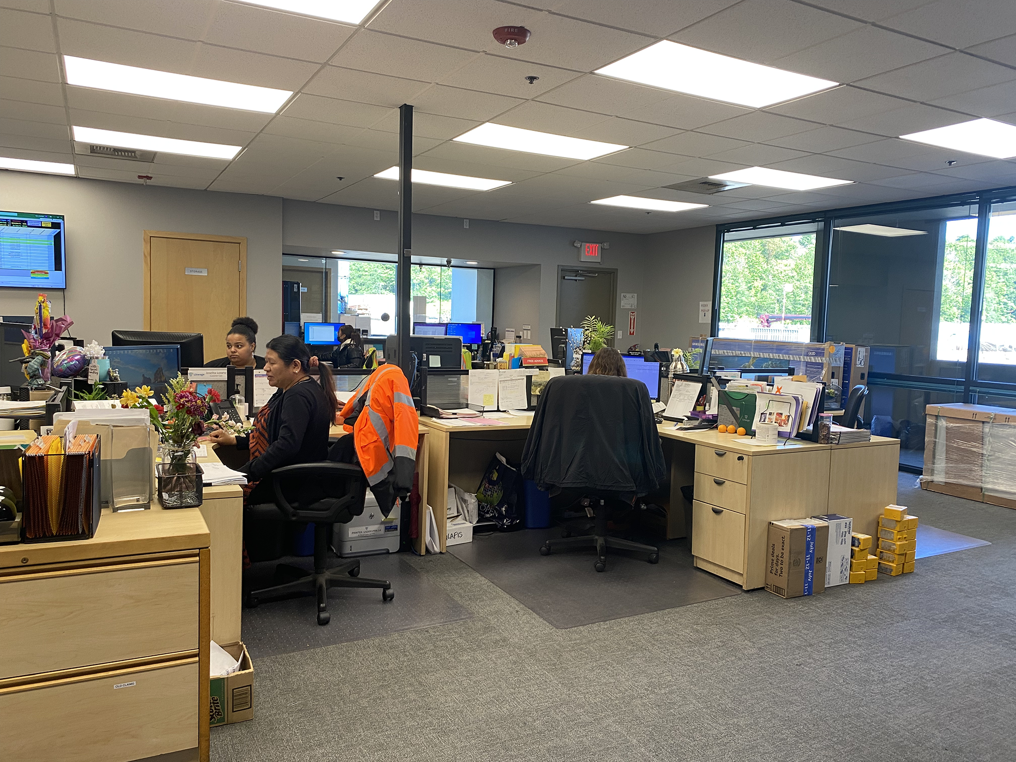 LIneage Logistics Seattle Garfield facility. The office shows the customer service representatives at their desks.
